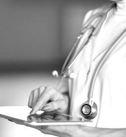 doctor working on tablet